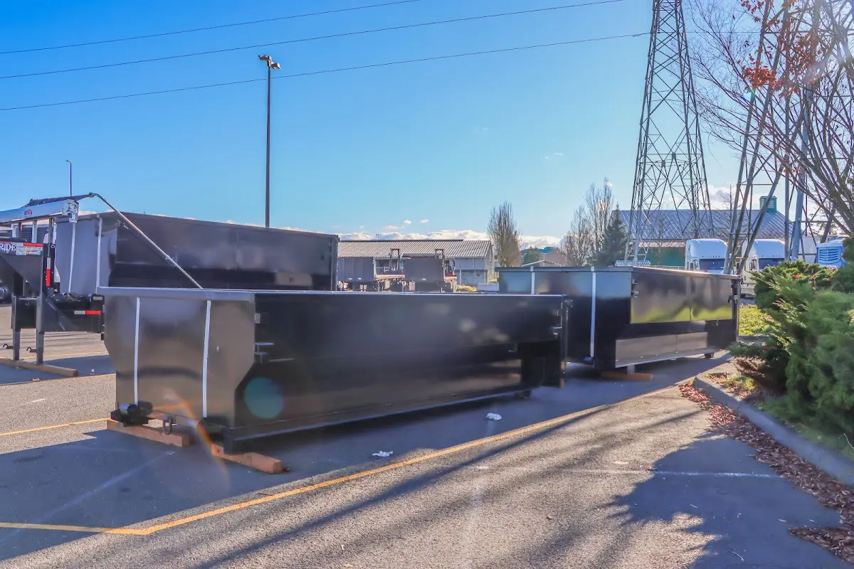 Roll-off dumpster ready for waste disposal at job site for 12 Yard Dumpster Rental in Byron